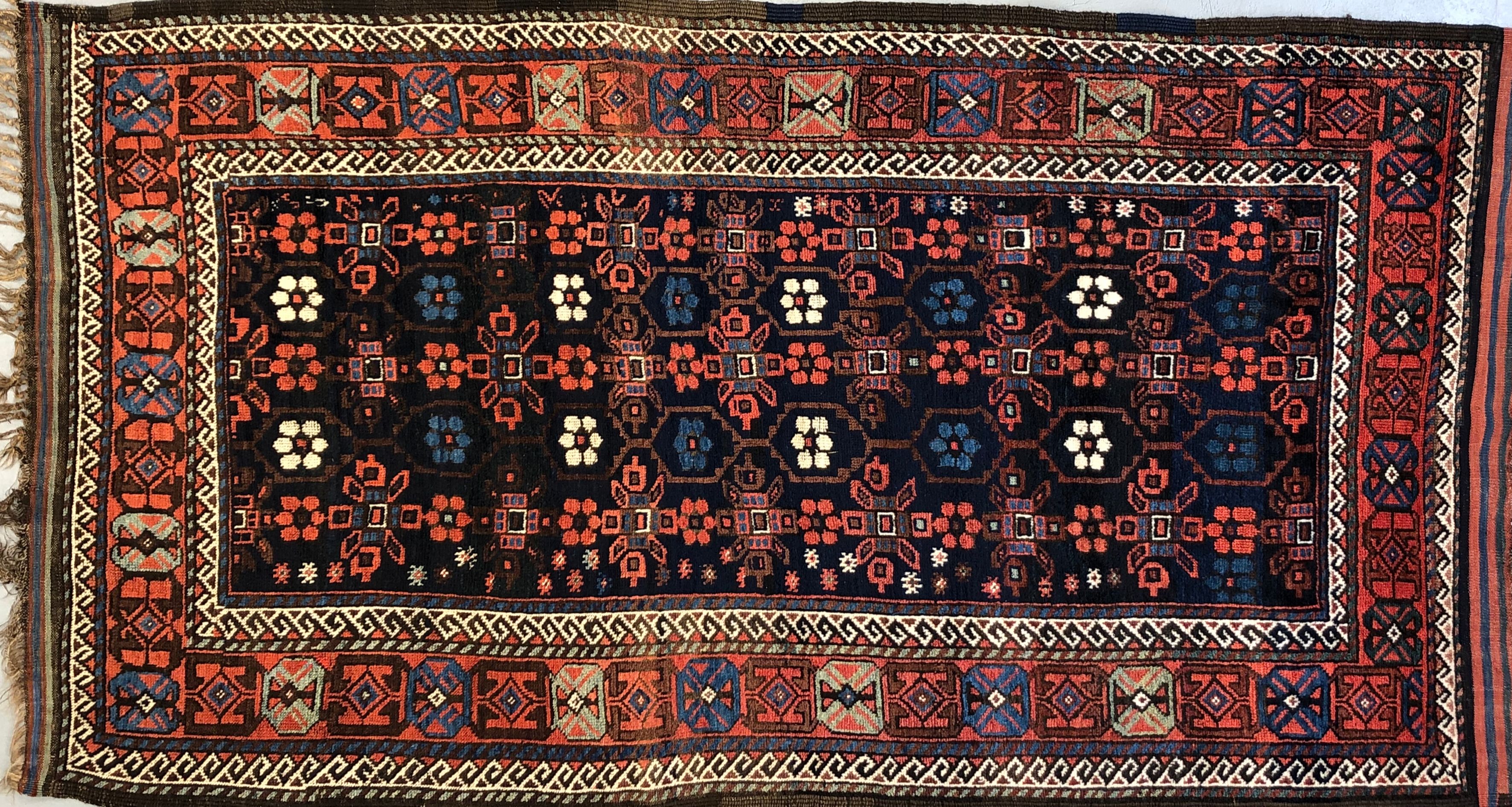 Antique Baluch rug