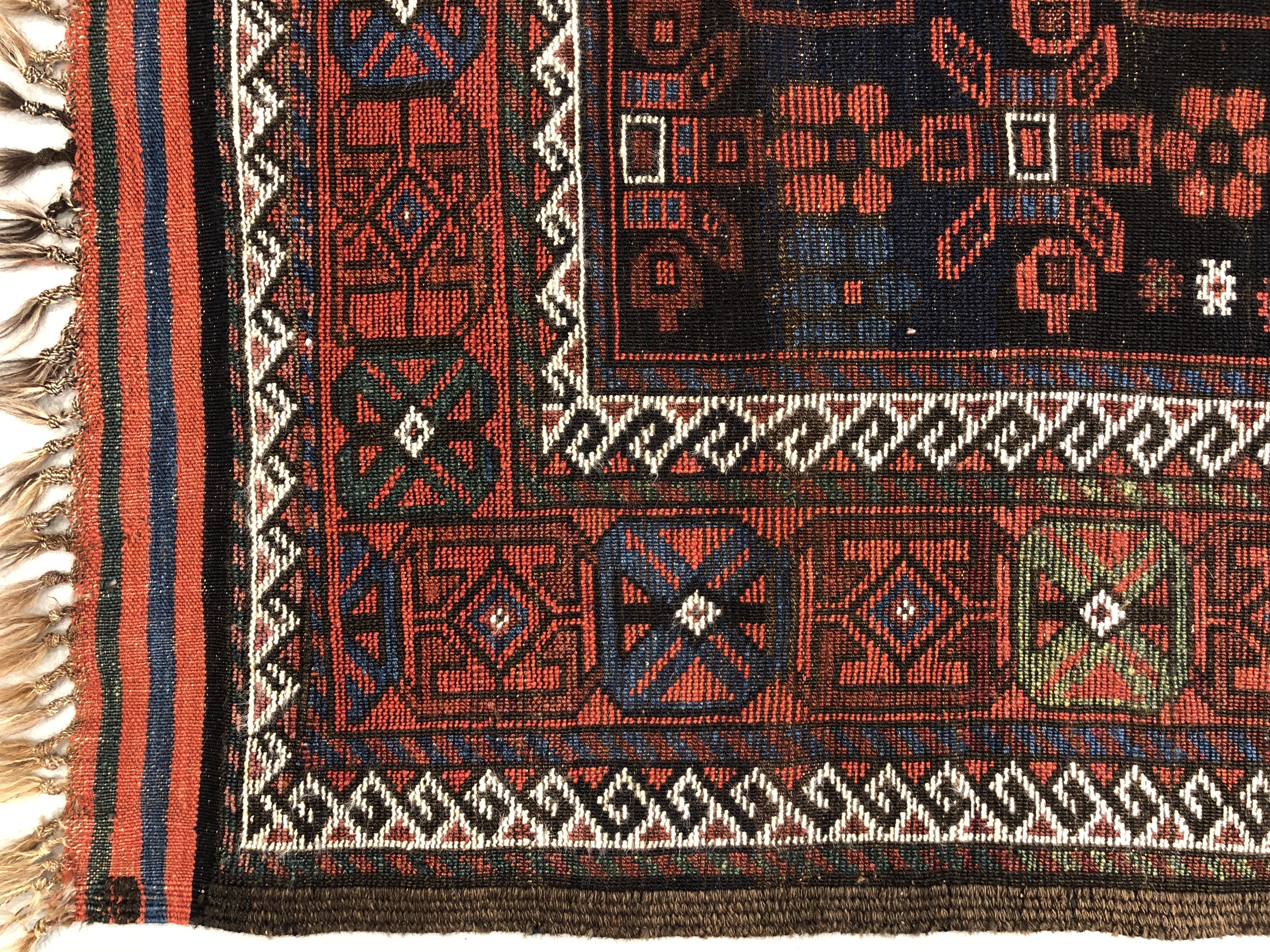 Antique Baluch rug