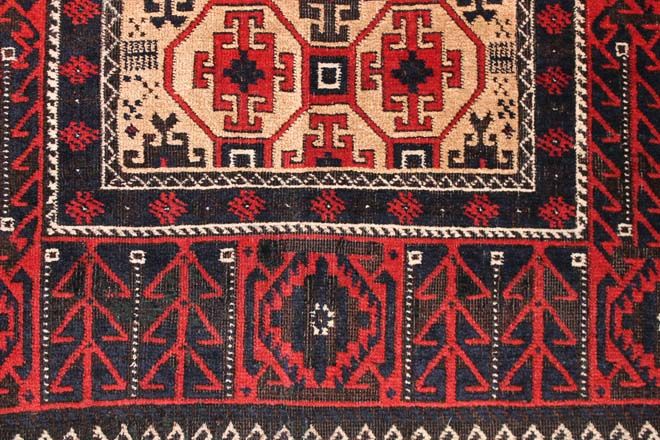 Antique Baluch rug
