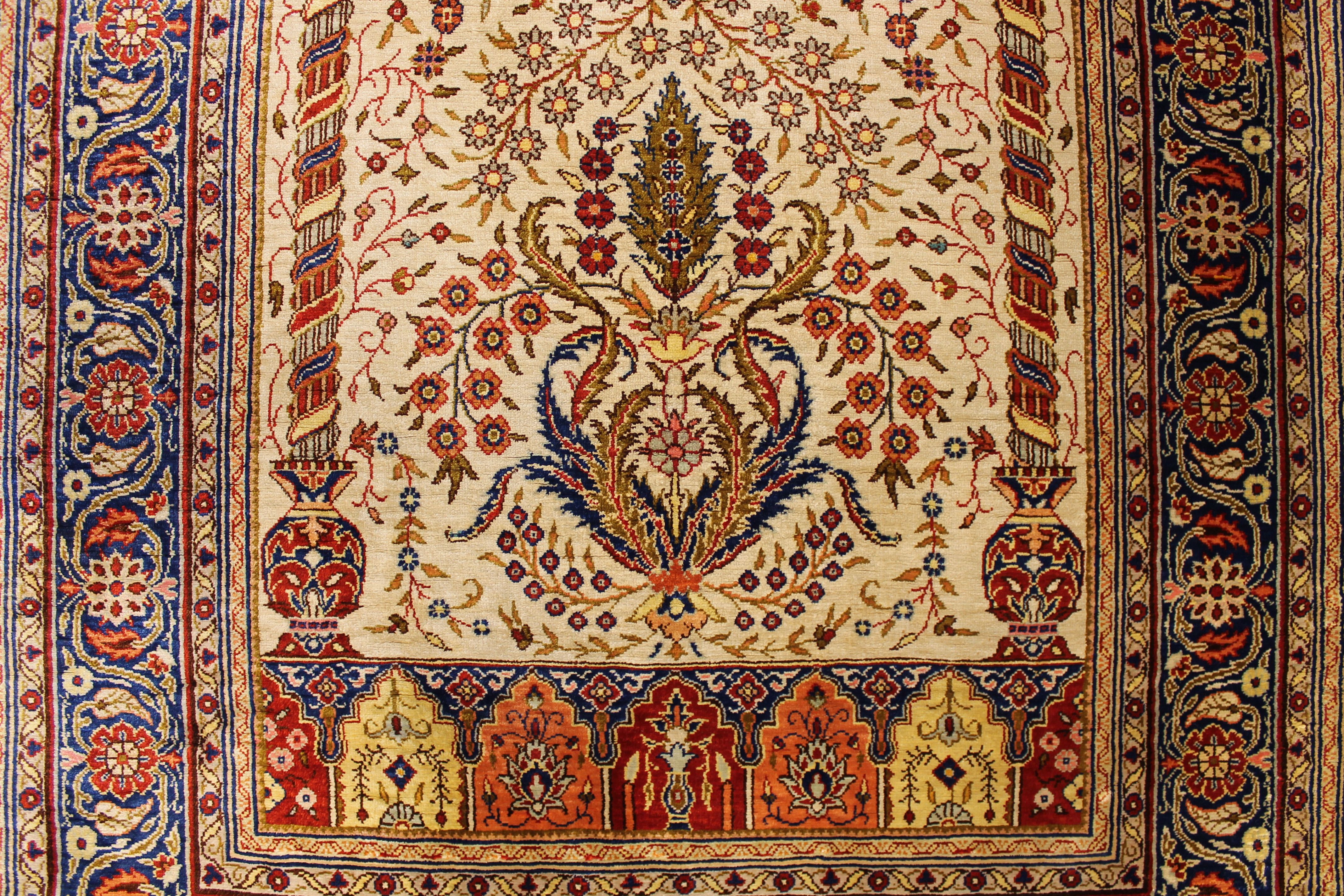 Antique silk Hereke rug
