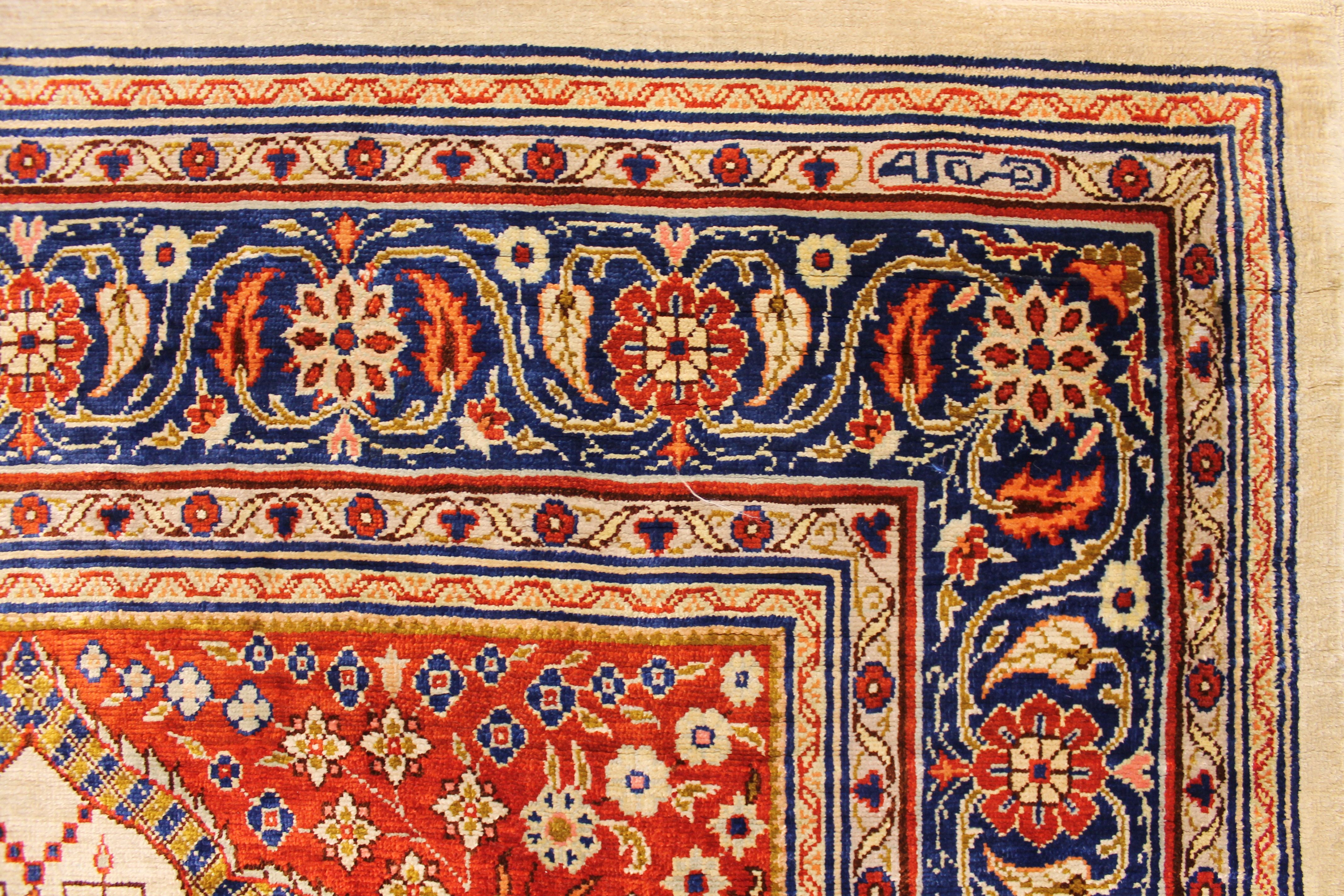 Antique silk Hereke rug