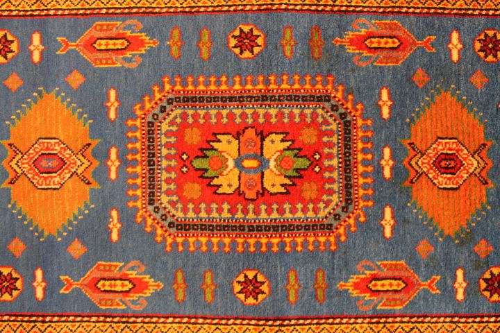 Old caucasian rug