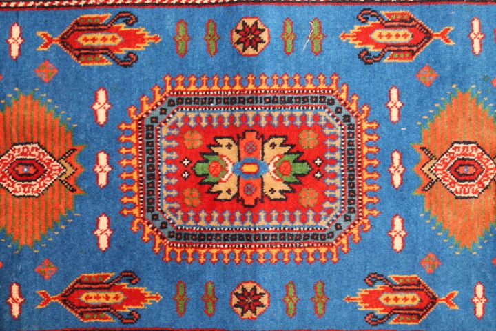 Old caucasian rug