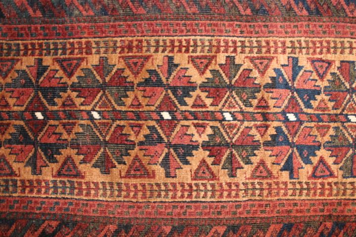 Antique Baluch rug