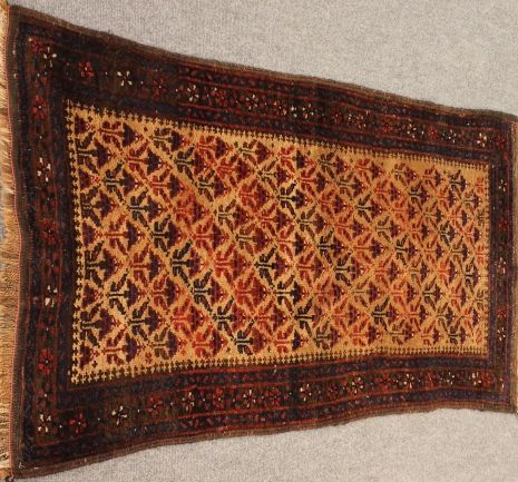 Antique Baluch rug