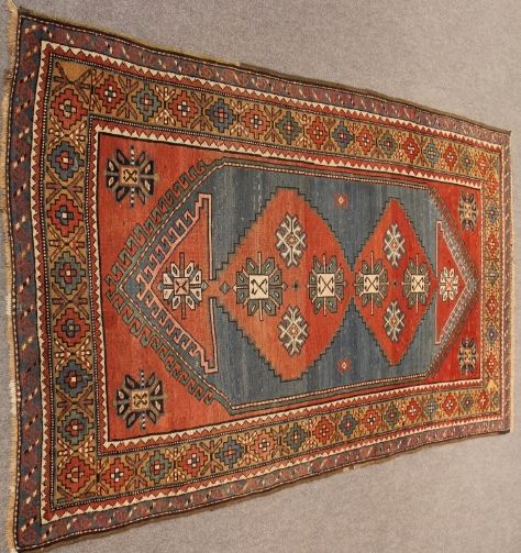Antique Kazak rug