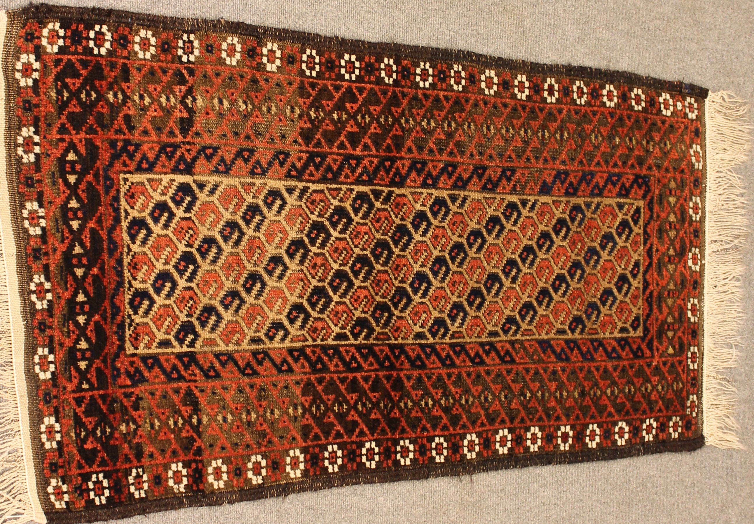 Antique Baluch rug