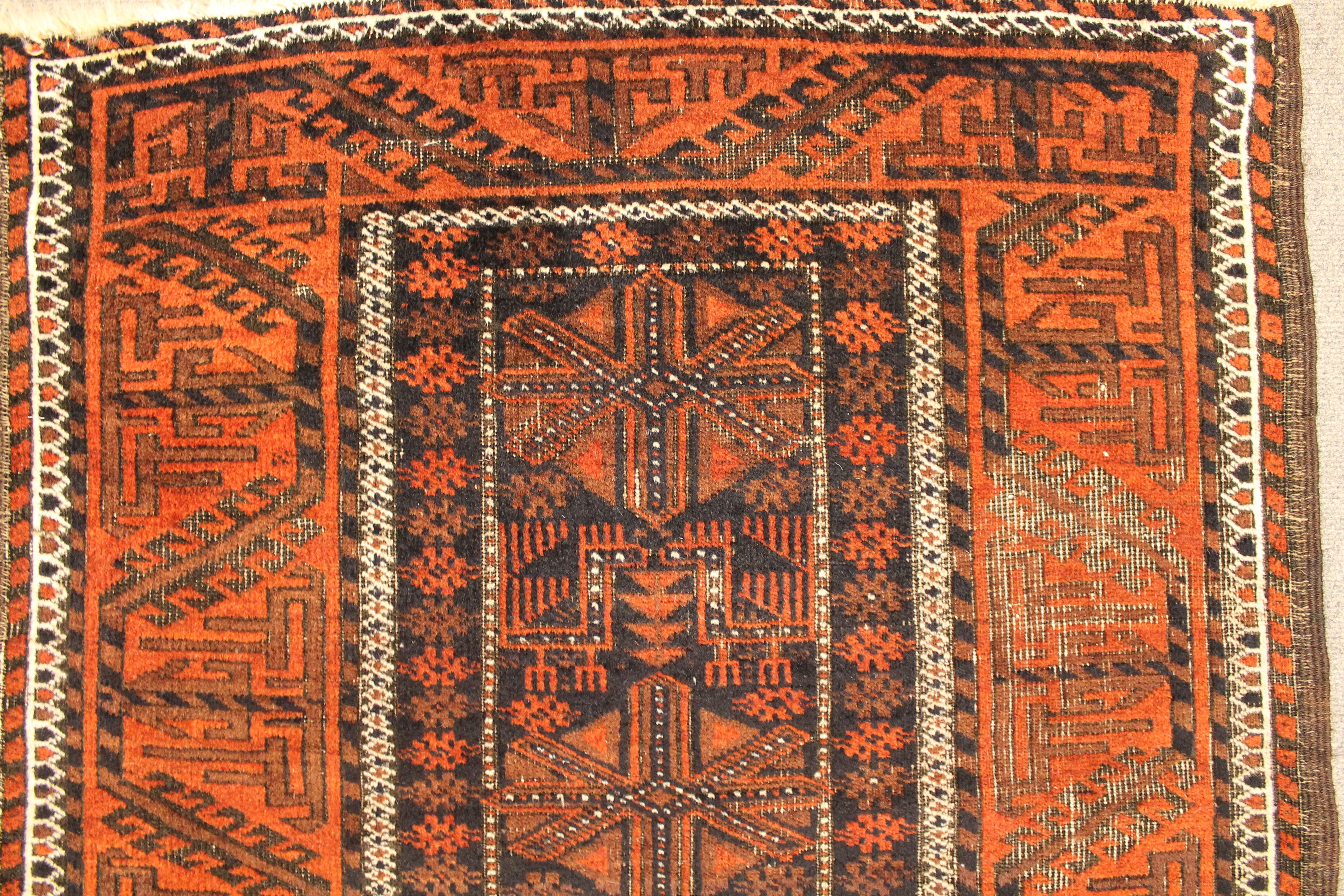 Antique Baluch rug