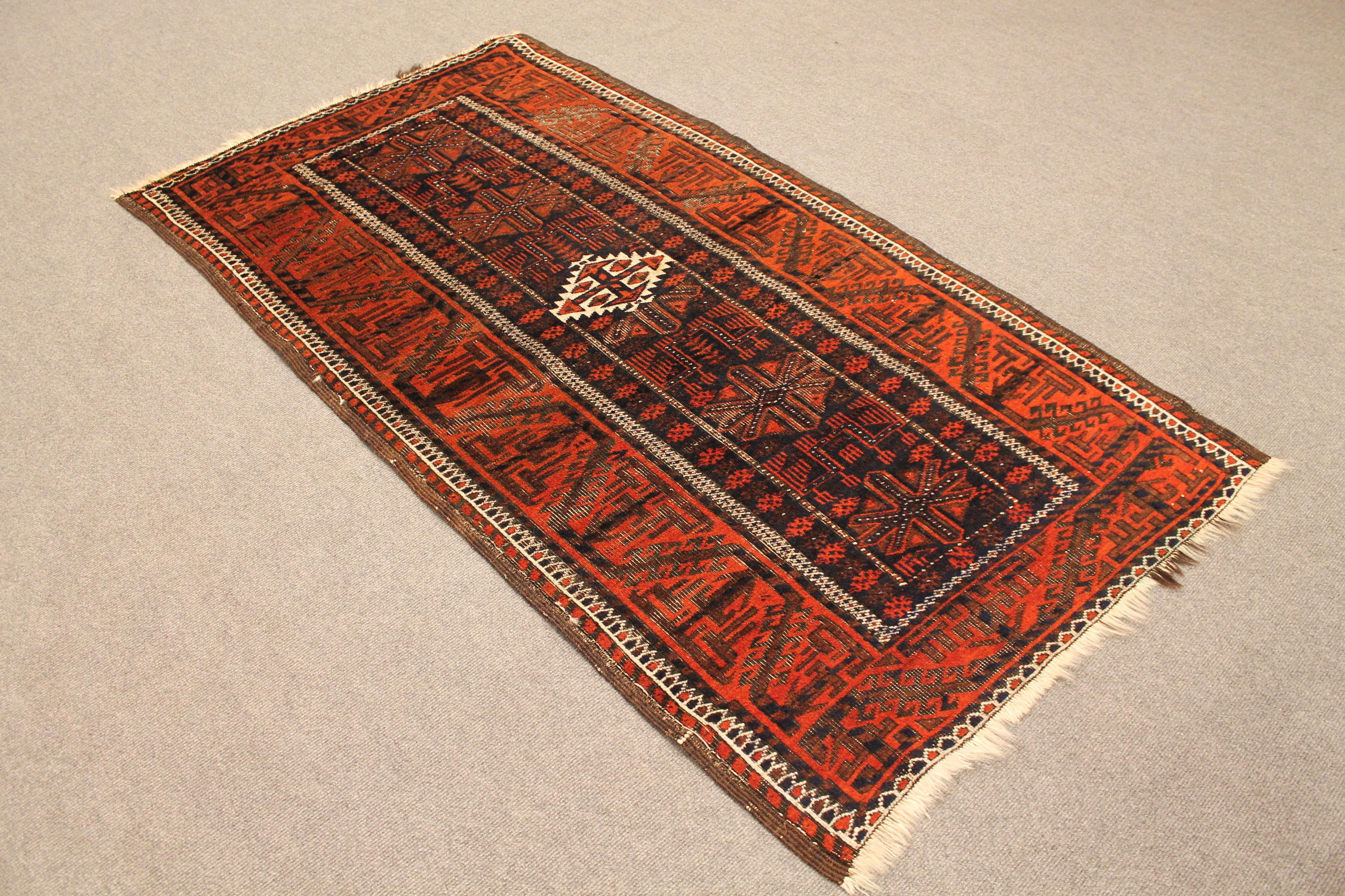 Antique Baluch rug