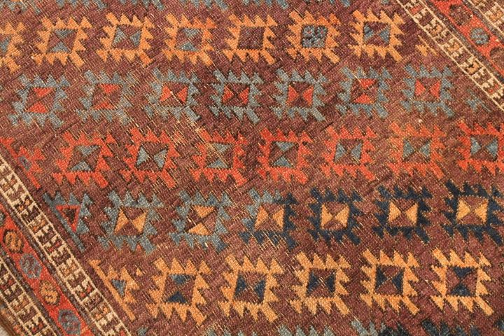 Antique Baluch rug