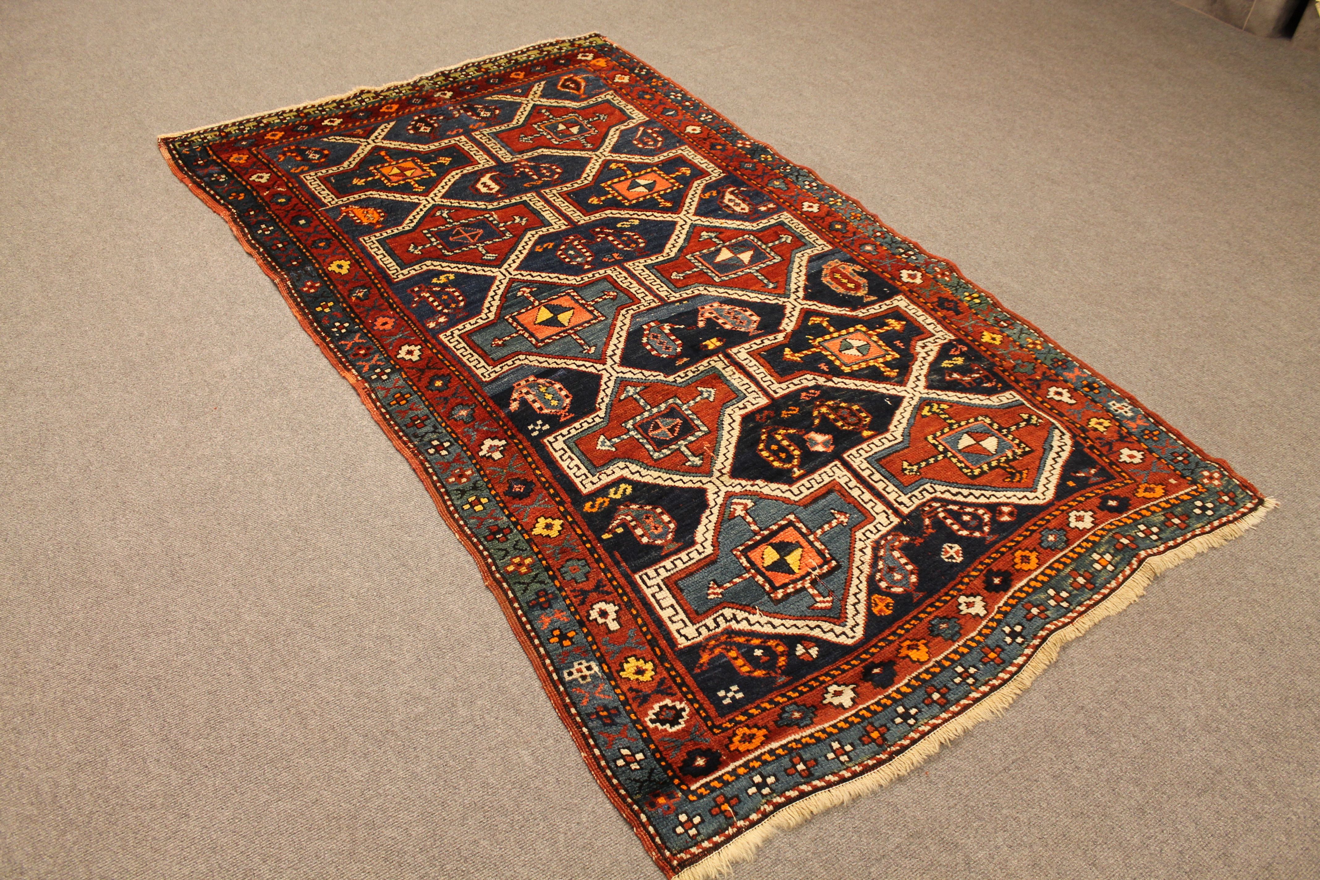 Antique Kazak rug