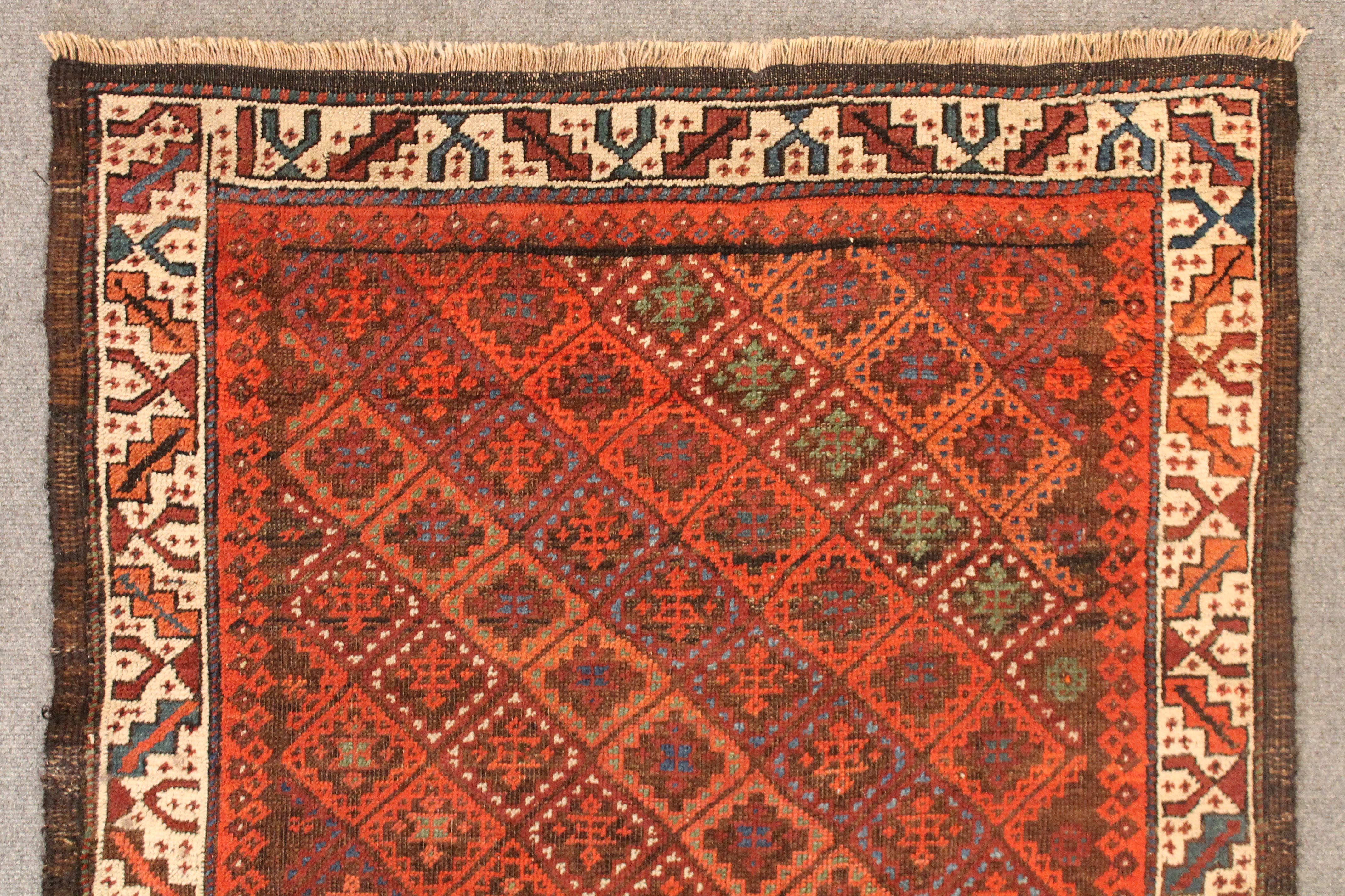 Antique Baluch rug