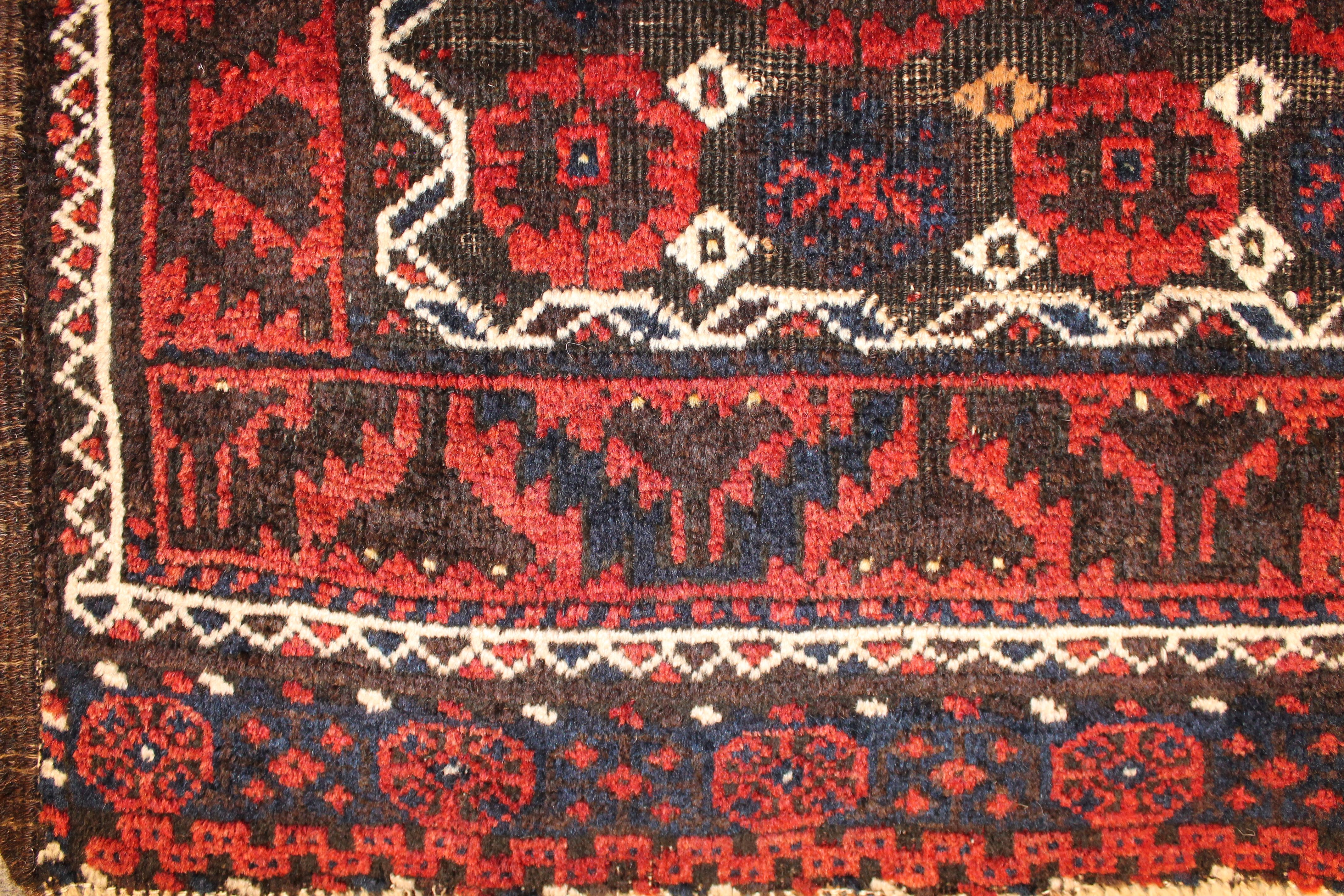Antique Baluch rug