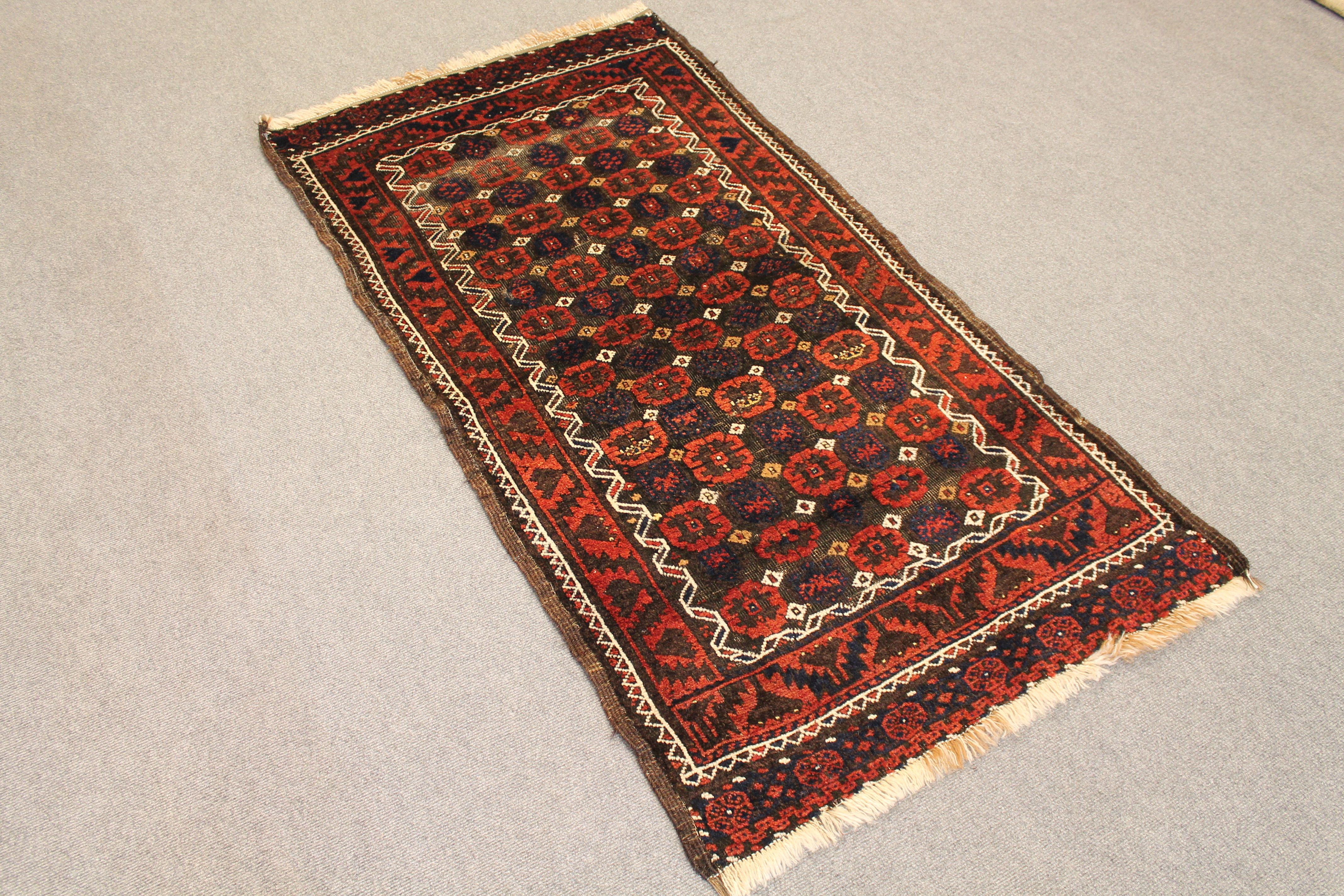 Antique Baluch rug