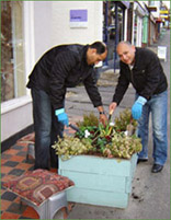 Anas and staff at The Oriental Rug Gallery Ltd plant-up for Weyhill in Bloom 2011.jpg