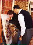 Rt Hon Jeremy Hunt weaving at The Oriental Rug Gallery Ltd, Haslemere Surrey.jpg